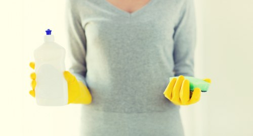 Carpet cleaning team applying safety checks before starting work